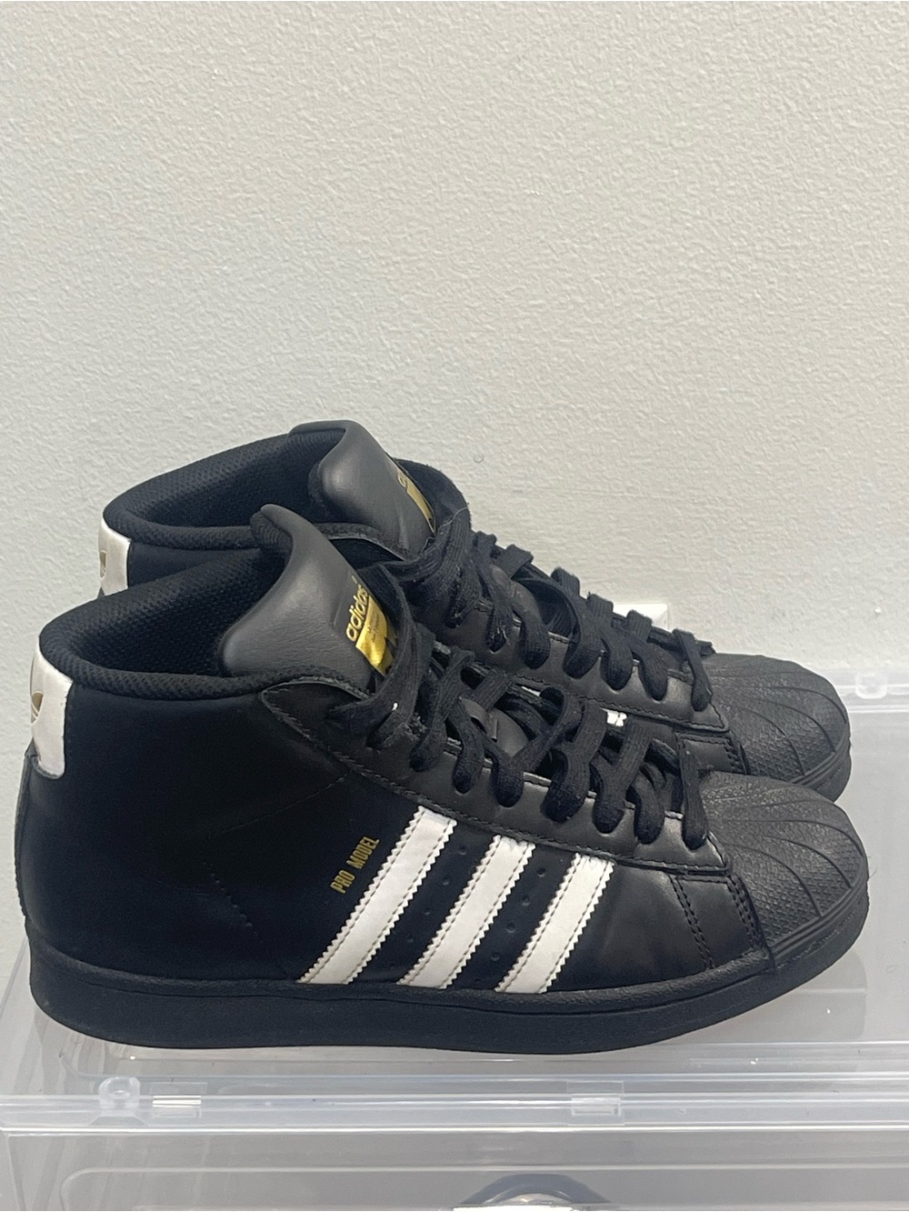 adidas Black & White High-Top Pro Model Sneakers with Gold Accents